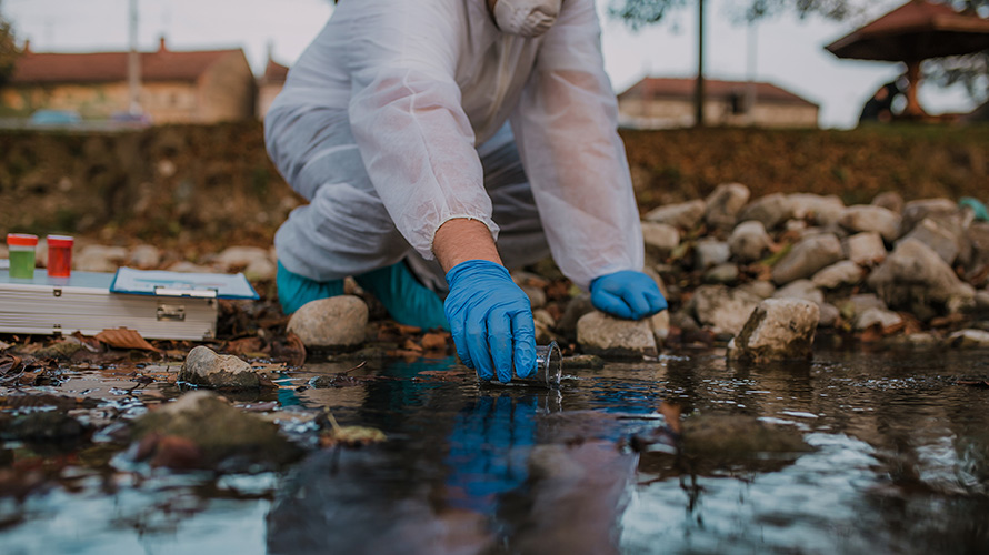 Scientist taking water sample